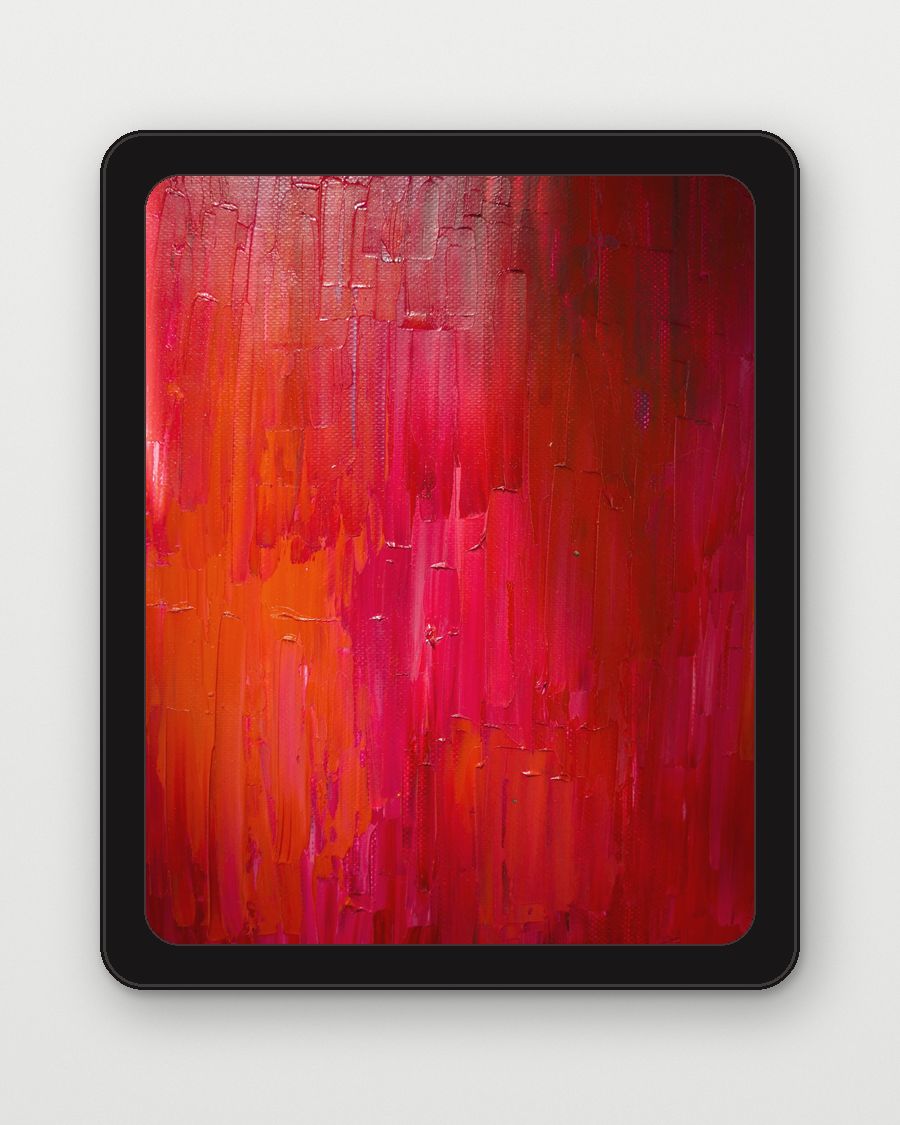 Pintura de rojos y rosados con marco negro de esquinas redondeadas sobre un muro claro