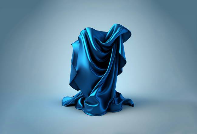 Tela azul drapeada sobre un fondo claro