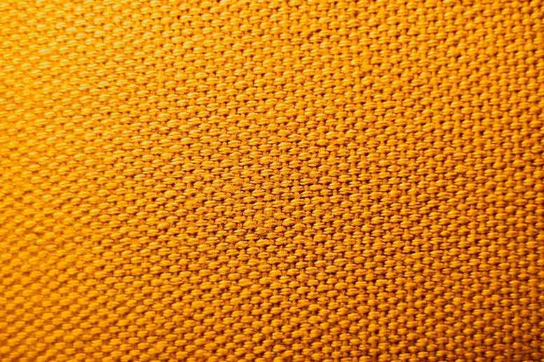 Tejido de punto amarillo de cerca