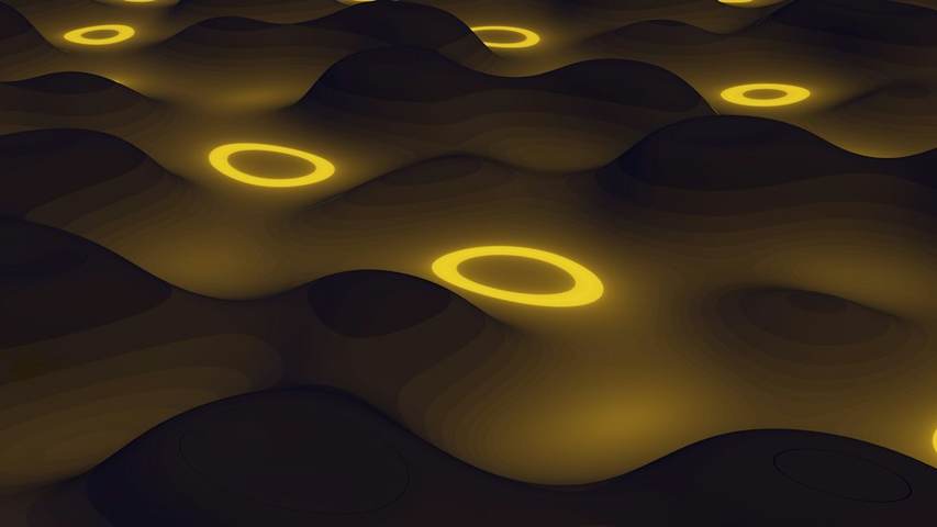 Anillos amarillos luminosos sobre un fondo oscuro