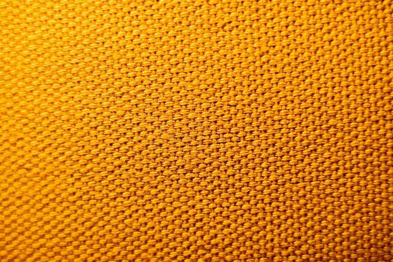 Tejido de punto amarillo visto de cerca