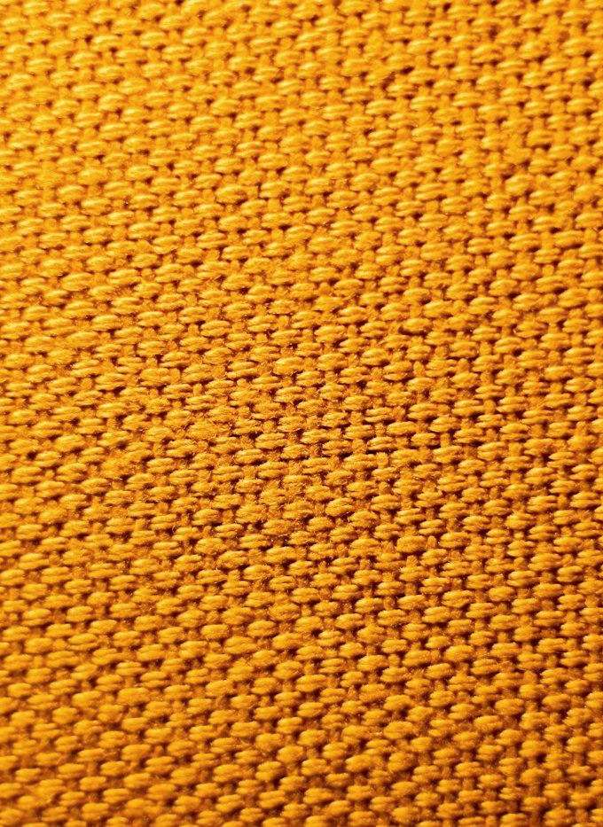 Tejido de punto ocre visto de cerca